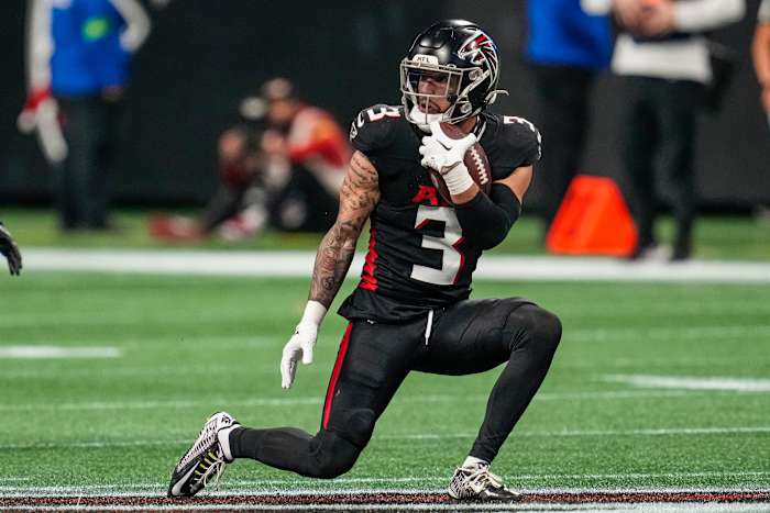 Dec 24, 2023; Atlanta, Georgia, USA; Atlanta Falcons safety Jessie Bates III (3) runs after intercepting a pass against the Indianapolis Colts during the second half at Mercedes-Benz Stadium.