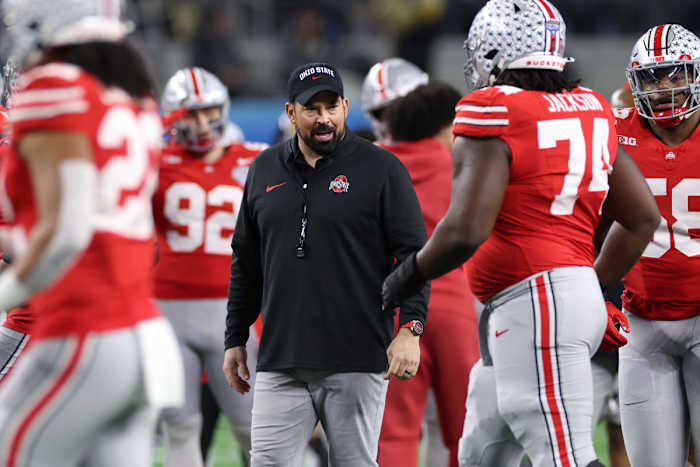 Dec 29, 2023; Arlington, TX, USA; Ohio State Buckeyes head coach Ryan Day walks on the field before the game against the Missouri Tigers at AT&T Stadium.