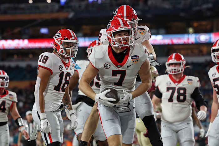 Dec 30, 2023; Miami Gardens, FL, USA; Georgia Bulldogs tight end Lawson Luckie (7) reacts after scoring a touchdown against the Florida State Seminoles during the second half in the 2023 Orange Bowl at Hard Rock Stadium. © Nathan Ray Seebeck-USA TODAY Sports