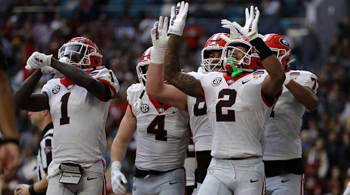 Kendall Milton celebrates a touchdown in the Orange Bowl.