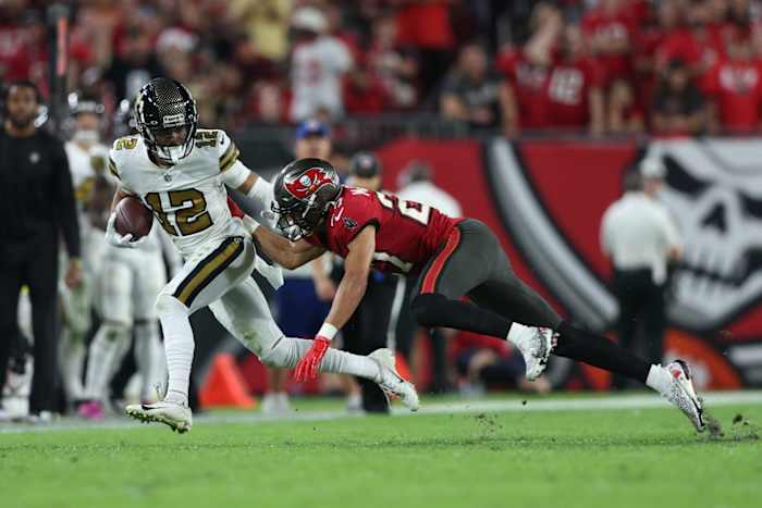 New Orleans Saints wide receiver Chris Olave (12) after a catch against Tampa Bay Buccaneers cornerback Zyon McCollum (27). Mandatory Credit: Nathan Ray Seebeck-USA TODAY Sports