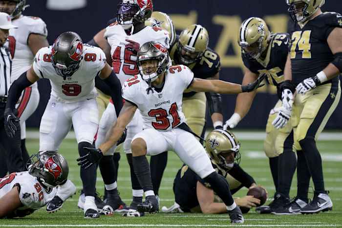 Tampa Bay Buccaneers safety Antoine Winfield Jr. (31) celebrates a sack of New Orleans Saints quarterback Derek Carr (4). Mandatory Credit: Matthew Hinton-USA TODAY