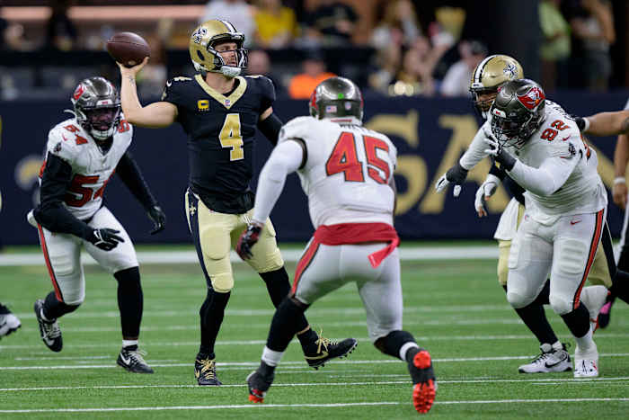 New Orleans Saints quarterback Derek Carr (4) throws under pressure against the Tampa Bay Buccaneers. Mandatory Credit: Matthew Hinton-USA TODAY