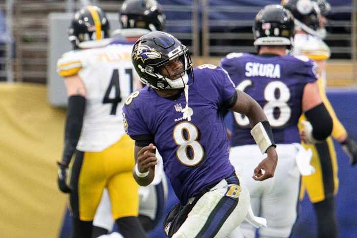 Nov 1, 2020; Baltimore, Maryland, USA; Baltimore Ravens quarterback Lamar Jackson (8) reacts after throwing a second half touchdown against the Pittsburgh Steelers at M&T Bank Stadium.