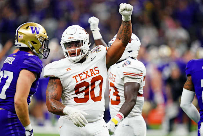 Texas Longhorns defensive lineman Bron Murphy celebrates a fourth-down stop against Washington in the Sugar Bowl.