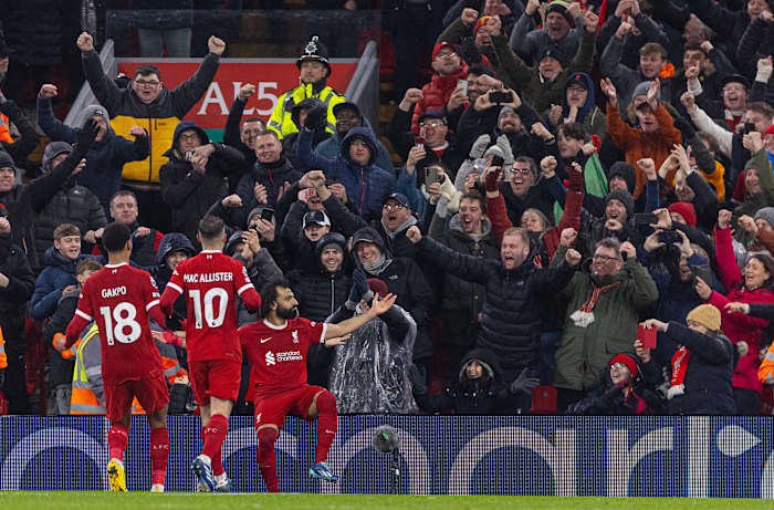 Liverpool's players and supporters pictured celebrating during a 4-2 win over Newcastle in the Premier League in January 2024
