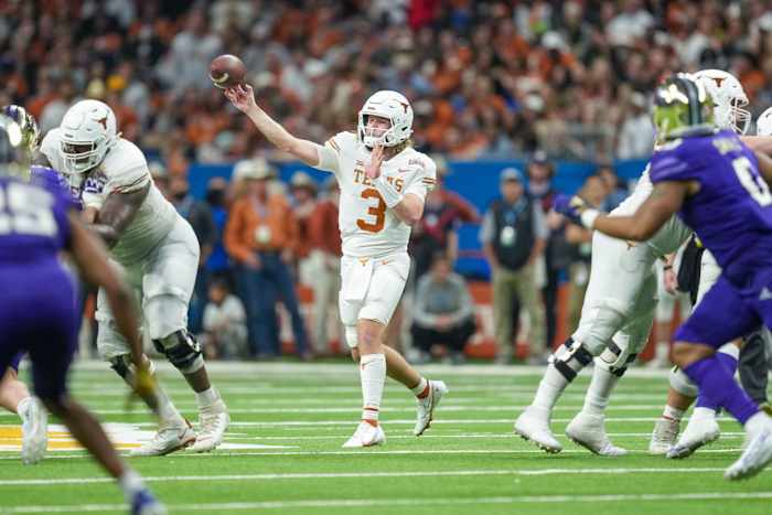 Dec 29, 2022; San Antonio, Texas, USA; Texas Longhorns quarterback Quinn Ewers (3) throws a pass in the 2022 Alamo Bowl against the Washington Huskies at the Alamodome.