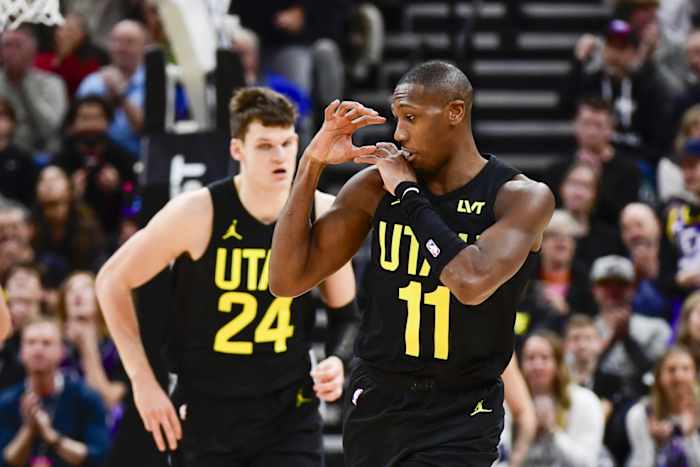  Utah Jazz guard Kris Dunn (11) reacts to a three point shot 