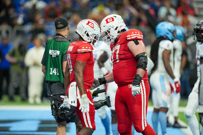 May 13, 2023; San Antonio, TX, USA; DC Defenders wide receiver Josh Hammond (0) celebrates his touchdown with offensive lineman Liam Fornadel (77) in the second half at the Alamodome. Mandatory Credit: Daniel Dunn-USA TODAY Sports