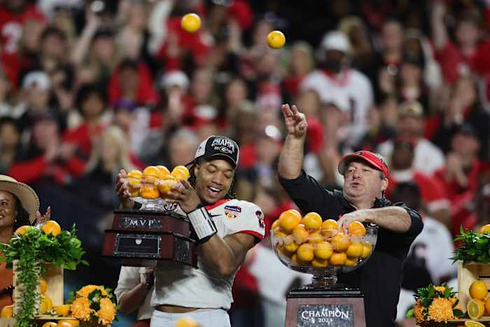 Dec 30, 2023; Miami Gardens, FL, USA; Georgia Bulldogs head coach Kirby Smart and running back Kendall Milton (2) react after the 2023 Orange Bowl at Hard Rock Stadium. (Sam Navarro / USA TODAY Sports).