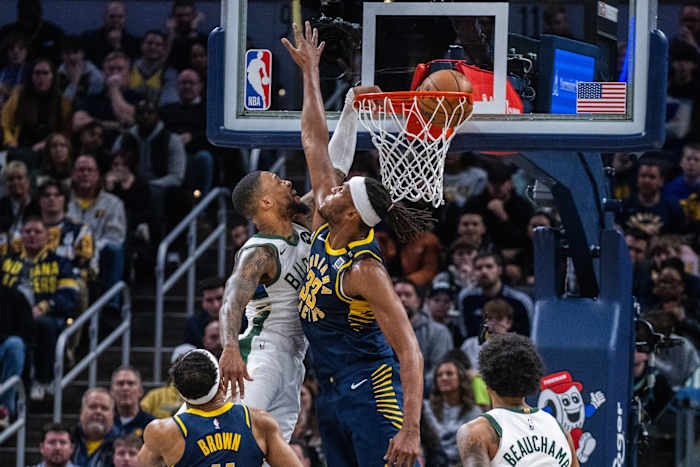 Milwaukee Bucks guard Damian Lillard (0) shoots the ball while Indiana Pacers center Myles Turner (33)