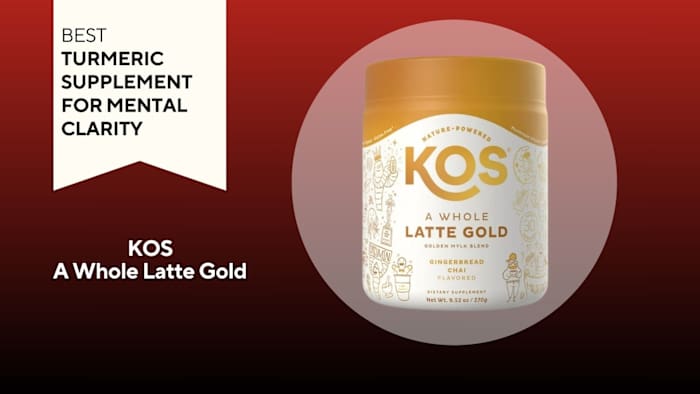 White tub with gold writing that reads "KOS A WHOLE LATTE GOLD" against a red background