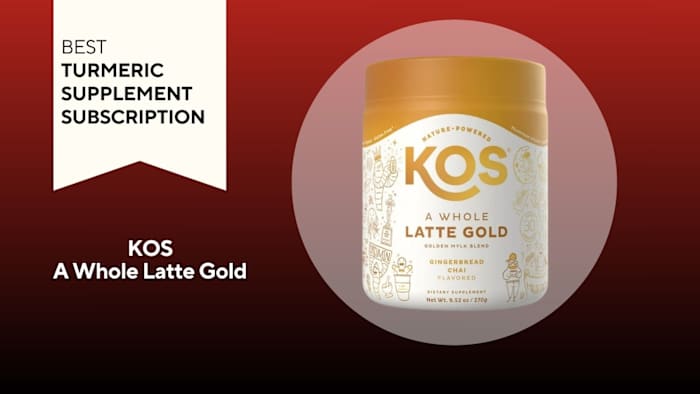 White tub with gold writing that reads "KOS A WHOLE LATTE GOLD" against a red background