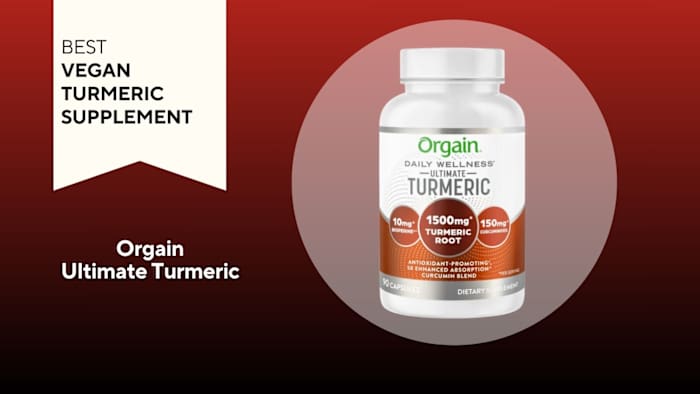 White pill bottle with a brown label against a red background