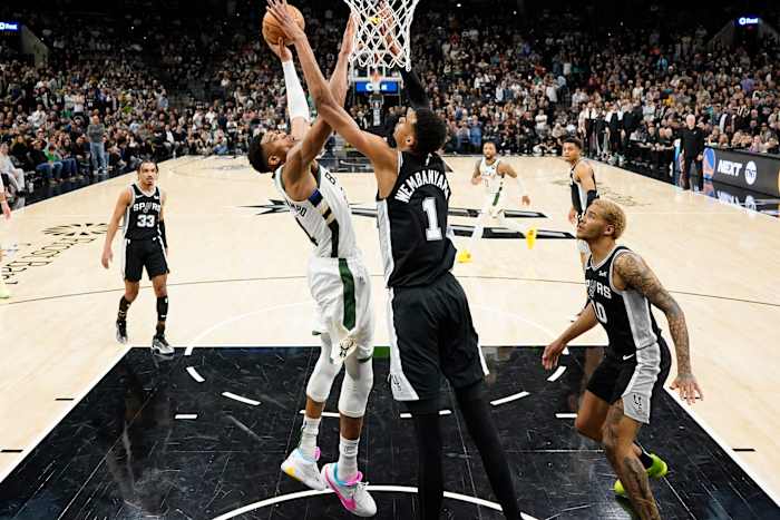 Jan 4, 2024; San Antonio, Texas, USA; Milwaukee Bucks forward Giannis Antetokounmpo (34) shoots over San Antonio Spurs forward Victor Wembanyama (1) during the second half at Frost Bank Center.
