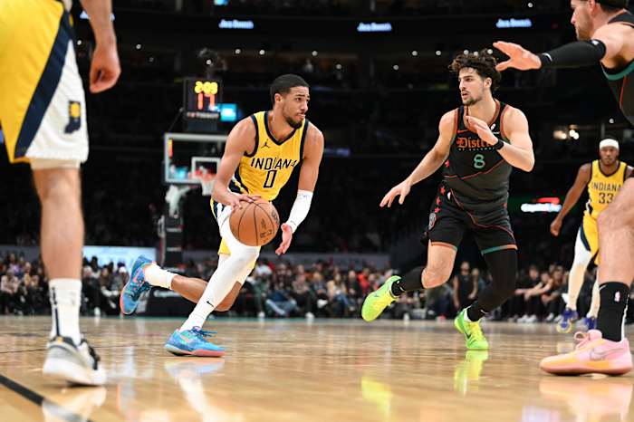 Indiana Pacers guard Tyrese Haliburton (0) makes a move the basket as Washington Wizards forward Deni Avdija (8) defends during the game at Capital One Arena. Washington Wizards defeated Indiana Pacers 137-123. Mandatory Credit: Tommy Gilligan-USA TODAY Sports