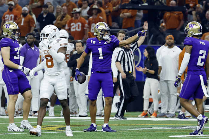 Washington Huskies wide receiver Rome Odunze (1) reacts after a play against the Texas Longhorns during the second quarter of the 2024 Sugar Bowl college football playoff semifinal game at Caesars Superdome.