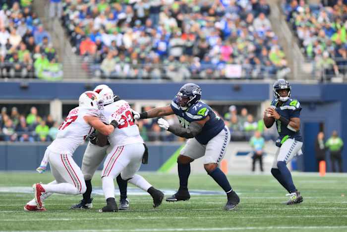 Oct 22, 2023; Seattle, Washington, USA; Seattle Seahawks quarterback Geno Smith (7) looks to pass the ball against the Arizona Cardinals during the first half at Lumen Field.