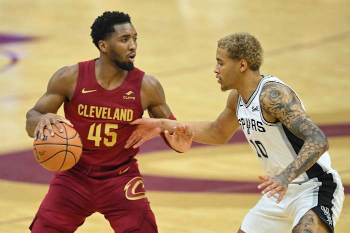 Spurs forward Jeremy Sochan guard Cleveland PG Donovan Mitchell. 
