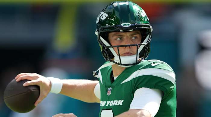 Jets quarterback Zach Wilson warms up before a game.
