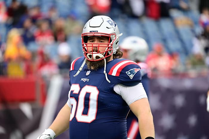 Dec 17, 2023; Foxborough, Massachusetts, USA; New England Patriots center David Andrews (60) warms up before a game against the Kansas City Chiefs at Gillette Stadium.