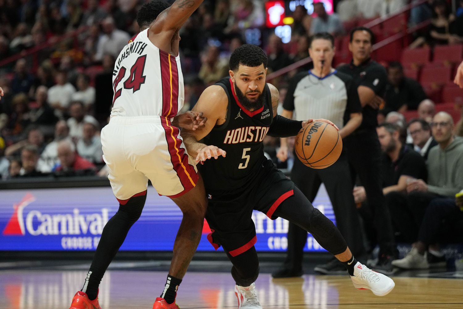 Houston Rockets guard Fred VanVleet drives past Miami Heat forward Haywood Highsmith
