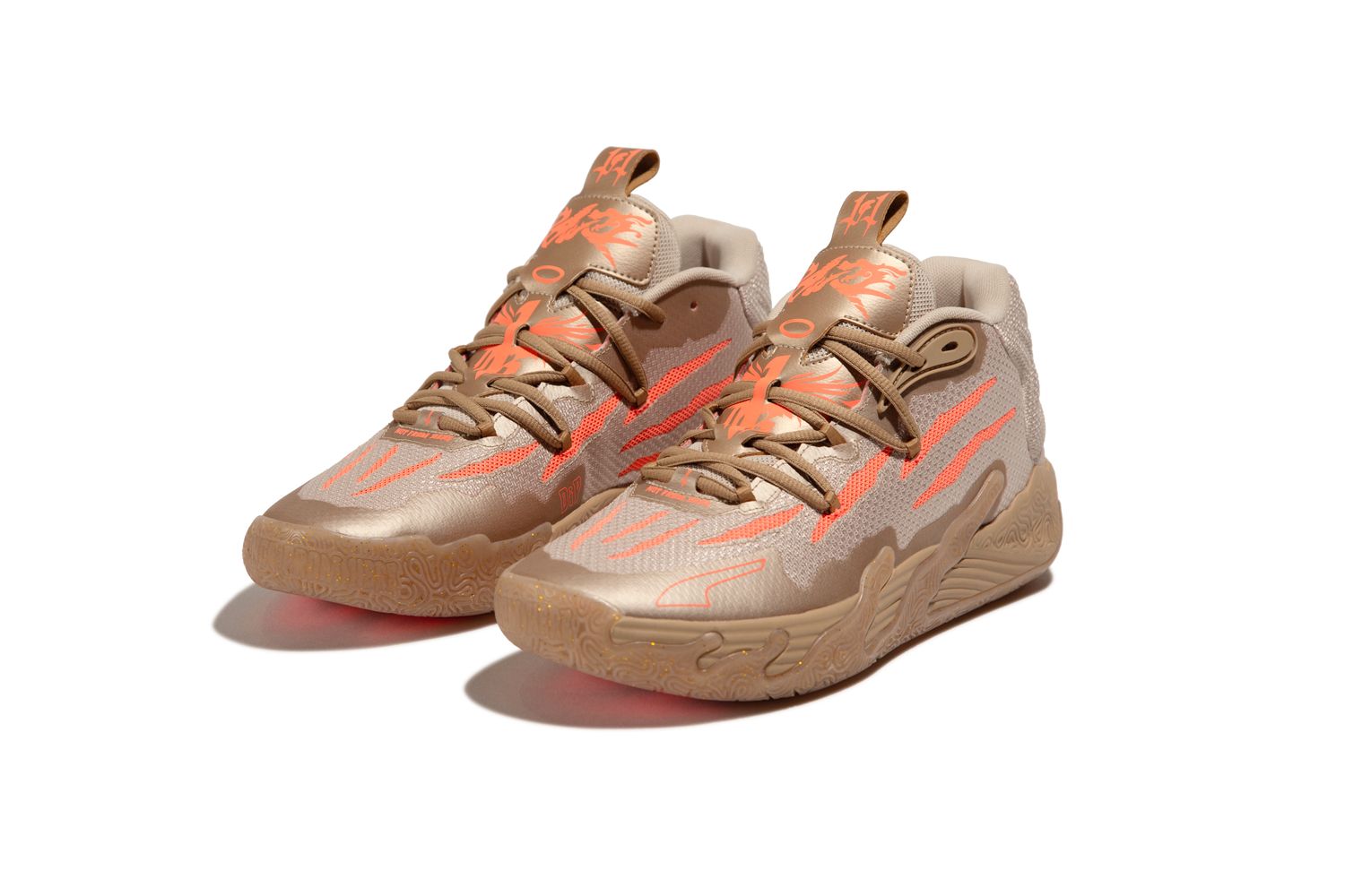 Side view of LaMelo Ball's gold and red PUMA sneakers.