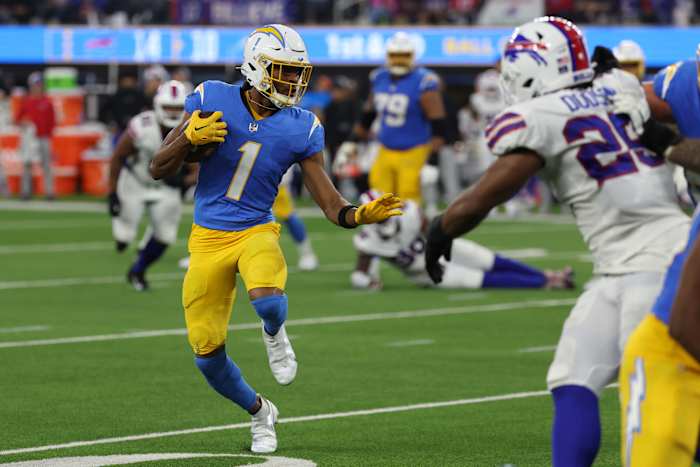 Dec 23, 2023; Inglewood, California, USA; Los Angeles Chargers wide receiver Quentin Johnston (1) runs with the ball during the third quarter against the Buffalo Bills at SoFi Stadium. Mandatory Credit: Kiyoshi Mio-USA TODAY Sports