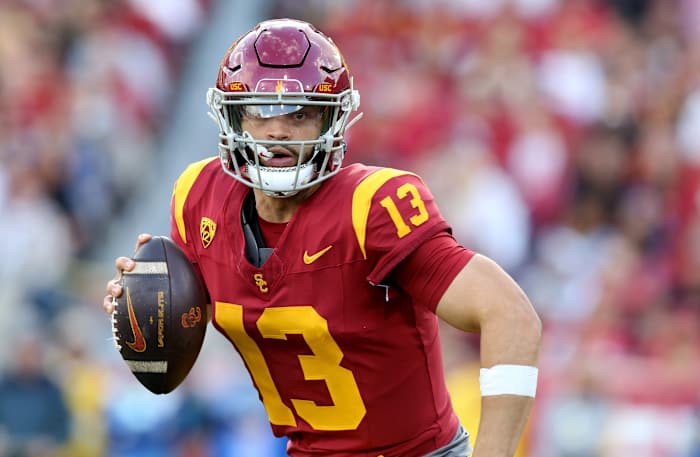 Nov 18, 2023; Los Angeles, California, USA; USC Trojans quarterback Caleb Williams (13) scrambles during the second quarter against the UCLA Bruins at United Airlines Field at Los Angeles Memorial Coliseum.