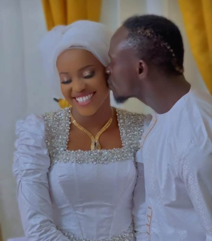 Sadio Mane pictured kissing his wife on their wedding day in January 2024