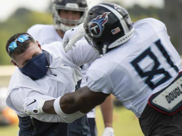 Tennessee Titans head coach Mike Vrabel works on blocking drills with tight end Jonnu Smith (81) during a training camp practice at Saint Thomas Sports Park Tuesday, Aug. 25, 2020 Nashville, Tenn.