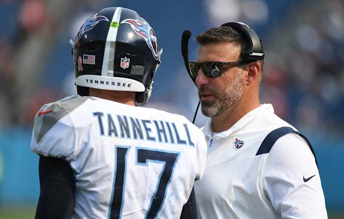 Sep 12, 2021; Nashville, Tennessee, USA; Tennessee Titans head coach Mike Vrabel talks with Tennessee Titans quarterback Ryan Tannehill (17) during the second half against the Arizona Cardinals at Nissan Stadium.