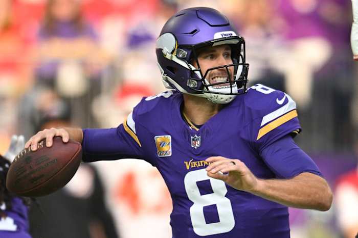 Oct 8, 2023; Minneapolis, Minnesota, USA; Minnesota Vikings quarterback Kirk Cousins (8) throws a pass during the first quarter against the Kansas City Chiefs at U.S. Bank Stadium.