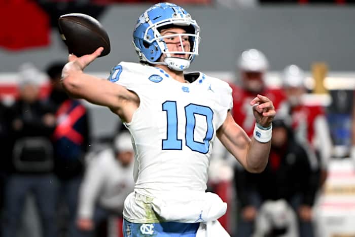 Nov 25, 2023; Raleigh, North Carolina, USA; North Carolina Tar Heels quarterback Drake Maye (10) throws a pass against the North Carolina State Wolfpack during the first half at Carter-Finley Stadium.