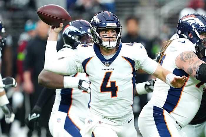 Jan 7, 2024; Paradise, Nevada, USA; Denver Broncos quarterback Jarrett Stidham (4) looks to pass against the Las Vegas Raiders during the first quarter at Allegiant Stadium. Mandatory Credit: Stephen R. Sylvanie-USA TODAY Sports  