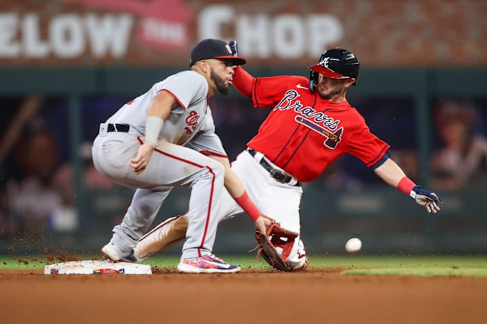 Sep 29, 2023; Atlanta, Georgia, USA; Atlanta Braves center fielder Forrest Wall (73) steals second past Washington Nationals second baseman Luis Garcia (2) in the seventh inning at Truist Park.