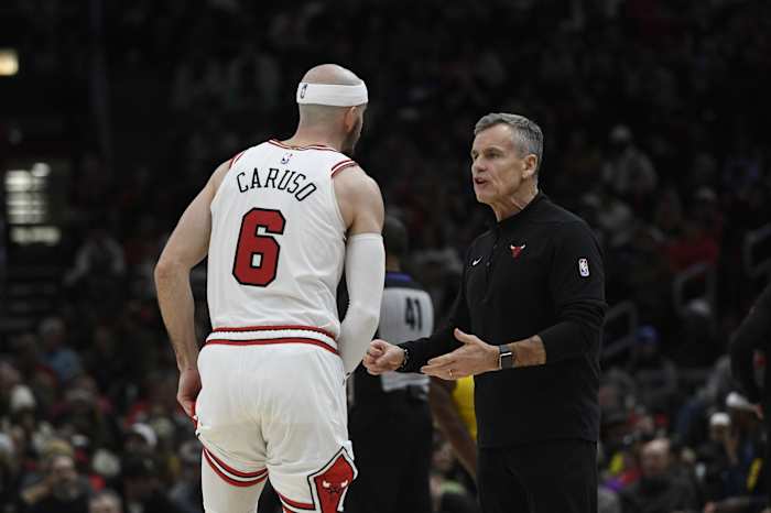 Chicago Bulls guard Alex Caruso (6) talks with Chicago Bulls head coach Billy Donovan during the second half against the Indiana Pacers at United Center.