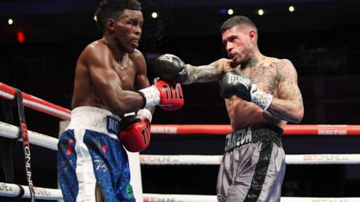 Arnold Barboza Jr. (R) lands a punch on Xolisani Ndongeni (L) at The Theater in Las Vegas. Arnold Barboza Jr. appears ready to take on the top competitors in the 140-pound division. CRIS ESQUEDA/GOLDEN BOY/GETTY IMAGES.