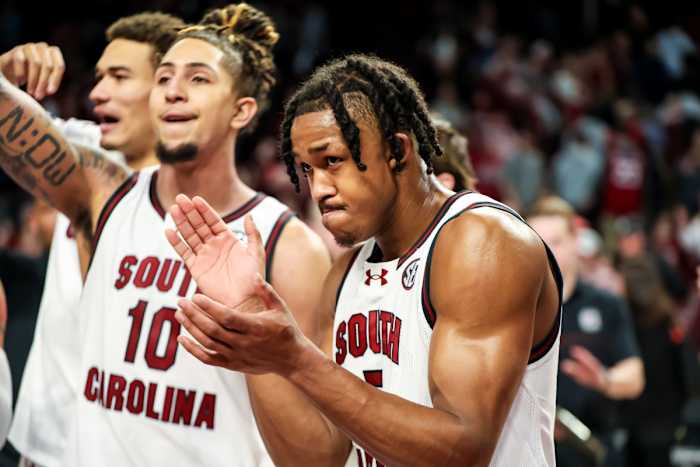 Meechie Johnson celebrates with teammates following their victory over the Mississippi State