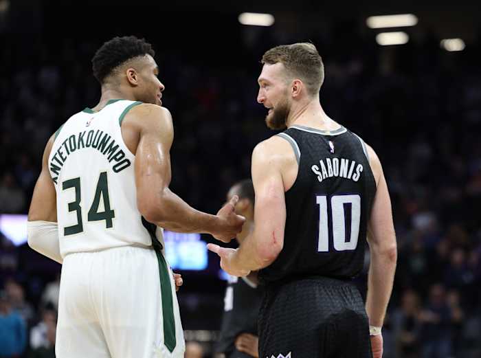 Milwaukee Bucks power forward Giannis Antetokounmpo (34) and Sacramento Kings power forward Domantas Sabonis (10)