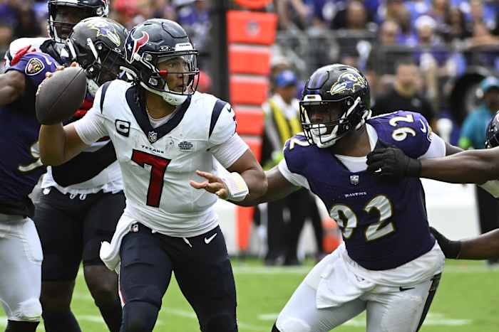 Sep 10, 2023; Baltimore, Maryland, USA; Houston Texans quarterback C.J. Stroud (7) attempts a pass as Baltimore Ravens defensive tackle Rayshad Nichols (91) rushes during the second half at M&T Bank Stadium.