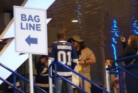 "May I See Your Ticket, Sir?" Sebastien Bourdais surprised Tampa Bay Lightning fans as they entered the arena for Saturday night's game vs. the Anaheim Ducks. Photo by Dylan Spaulding.