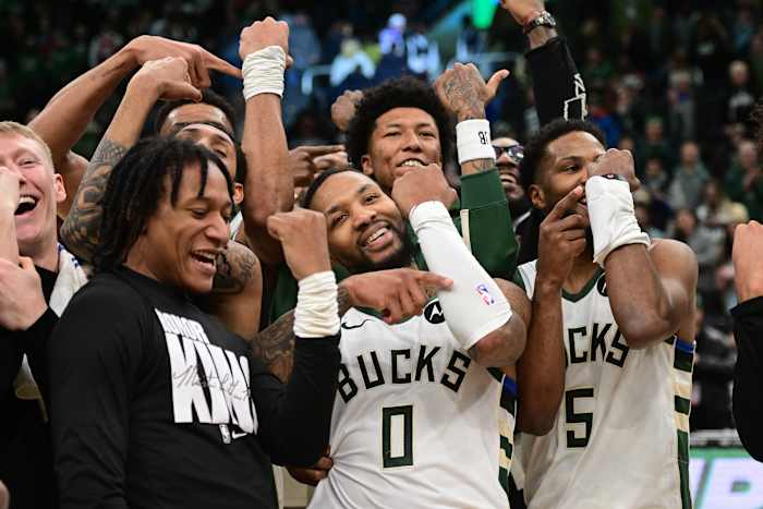 Milwaukee Bucks guard Damian Lillard (0) celebrates with teammates