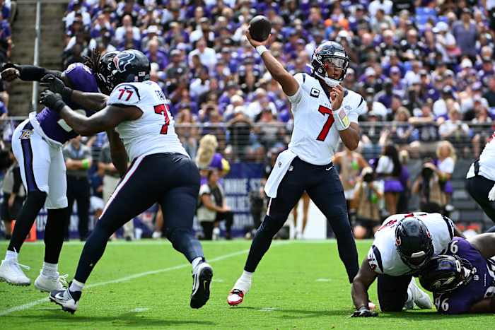 Texans quarterback C.J. Stroud (7) attempts a pass against the Baltimore Ravens during the first half at M&T Bank Stadium.