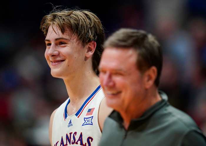 Nov 10, 2023; Lawrence, Kansas, USA; Kansas Jayhawks guard Johnny Furphy (10) and head coach Bill Self react during the second half against the Manhattan Jaspers at Allen Fieldhouse. Mandatory Credit: Jay Biggerstaff-USA TODAY Sports