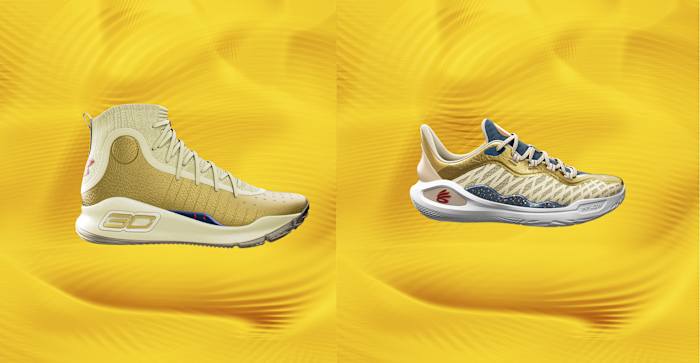 Side view of Stephen Curry's gold and white Under Armour sneakers.