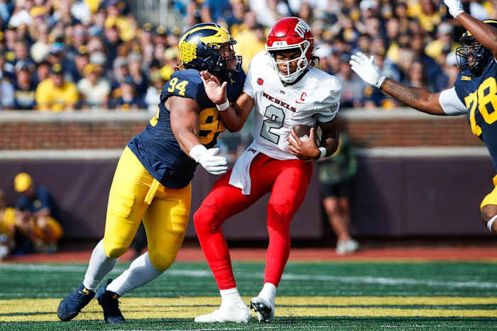 Michigan defensive lineman Kris Jenkins (94) sacks UNLV quarterback Doug Brumfield (2) during the first half at Michigan Stadium in Ann Arbor on Saturday, Sept. 9, 2023.  
