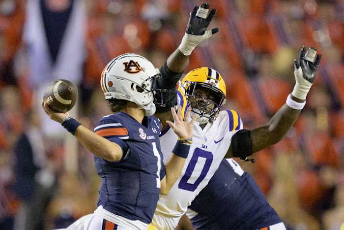 Oct 14, 2023; Baton Rouge, Louisiana, USA; LSU Tigers defensive tackle Maason Smith (0) pressures Auburn Tigers quarterback Payton Thorne (1) during the second quarter at Tiger Stadium. Mandatory Credit: Matthew Hinton-USA TODAY Sports  