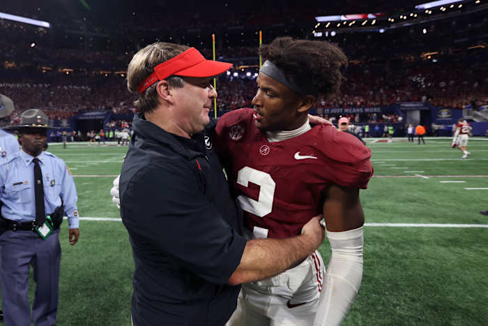 Dec 2, 2023; Atlanta, GA, USA; Georgia Bulldogs head coach Kirby Smart embraces Alabama Crimson Tide defensive back Caleb Downs (2) after the SEC championship game at Mercedes-Benz Stadium. Mandatory Credit: Brett Davis-USA TODAY Sports