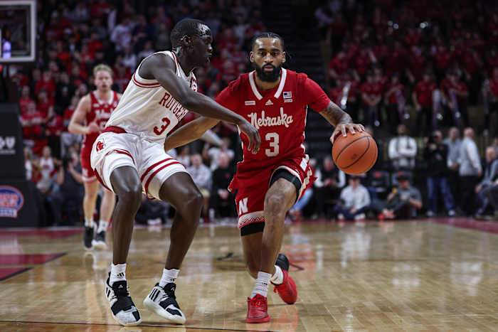 Jan 17, 2024; Piscataway, New Jersey, USA; Nebraska Cornhuskers guard Brice Williams (3) dribbles against Rutgers Scarlet Knights forward Mawot Mag (3) during the first half at Jersey Mike's Arena.